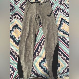 Nike athletic pants. Gray & black. US size XS. Medium wear, good condition.